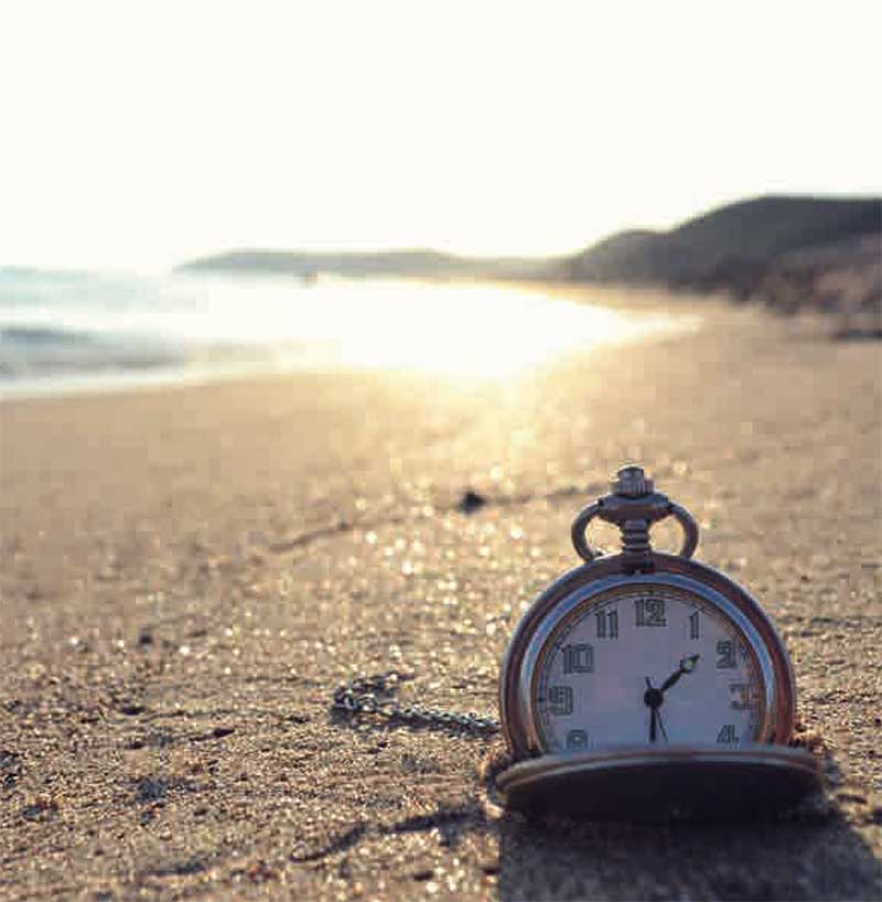 Taschenuhr im Sand Taschenuhr im Sand